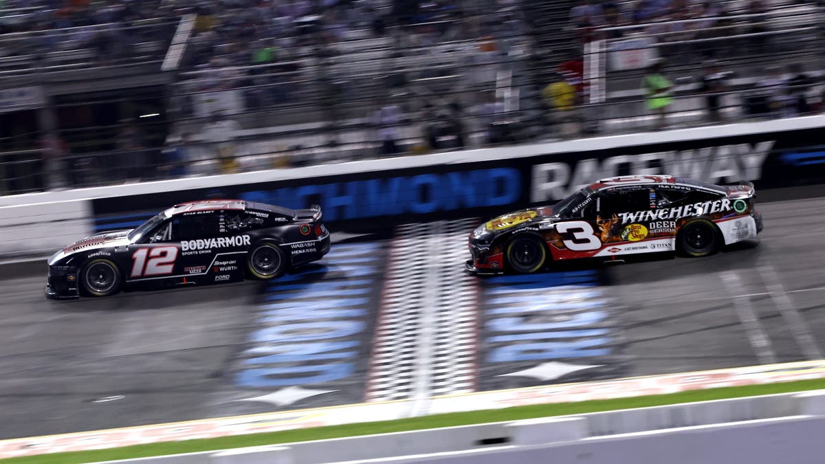 Ryan Blaney and Austin Dillon race during the NASCAR Cup Series Cook Out 400 at Richmond Raceway