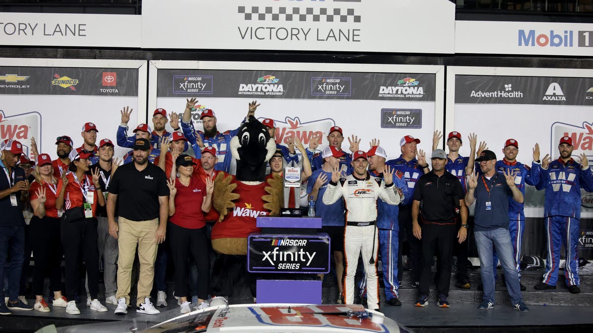 Parker Kligerman, relief driver for Conner Zilisch celebrates winning the Xfinity Series at Daytona.