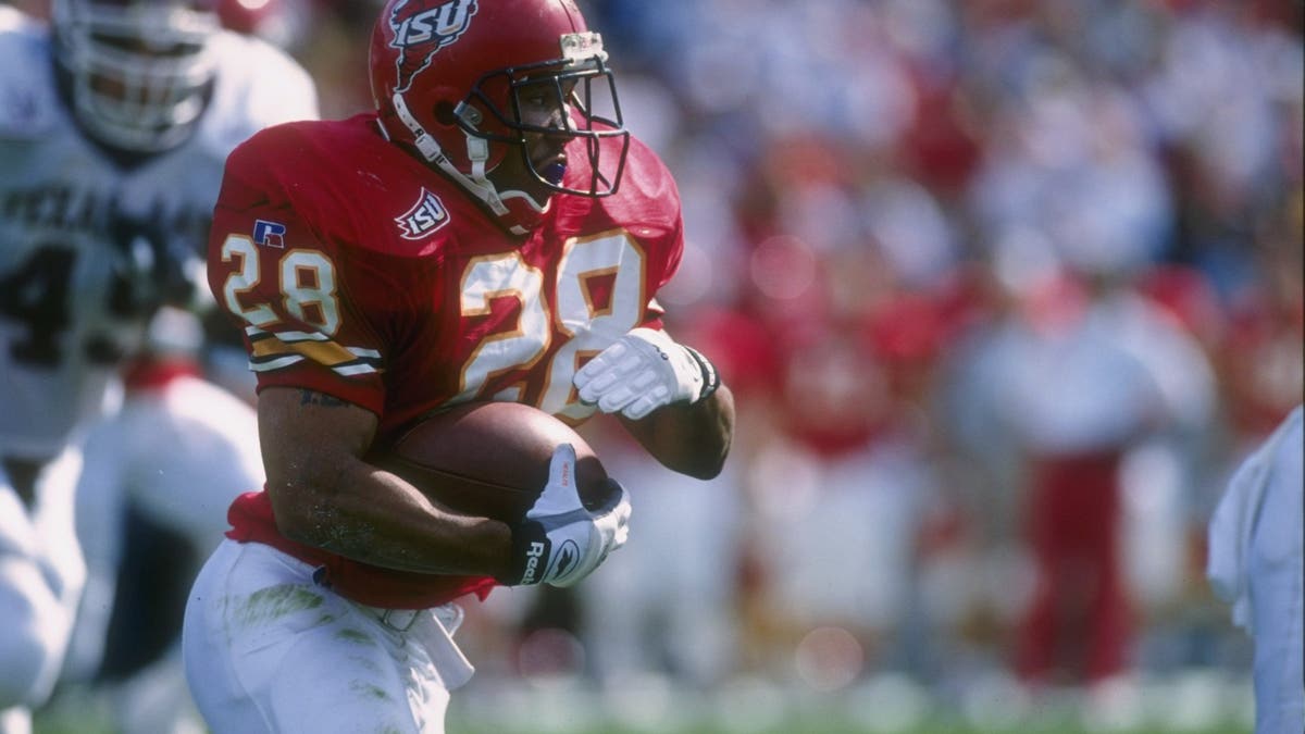 Running back Troy Davis #28 of the Iowa State Cyclones keeps his eyes focused during a carry against Texas A&amp;M at Cyclone Stadium in Ames, Iowa.