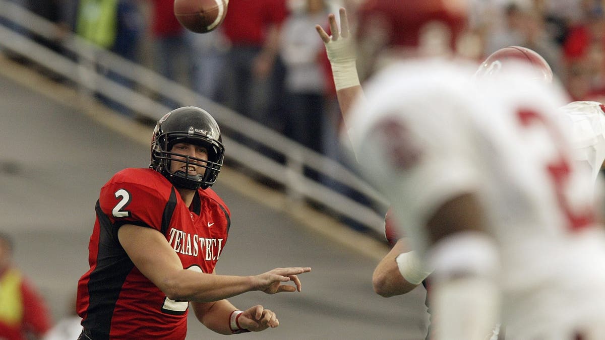 B.J. Symons threw for a nation-high 5,833 yards and 52 touchdowns in 2003. (Photo by Ronald Martinez/Getty Images)