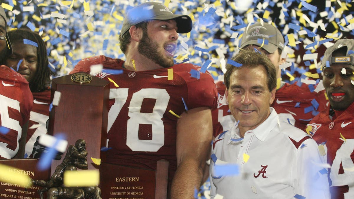 Alabama's win over Florida in the 2009 SEC Championship Game showed the mindset of a team being the hunters taking down the hunted, according to Urban Meyer. (Photo by Jeff Robinson/Icon SMI/Icon Sport Media via Getty Images)