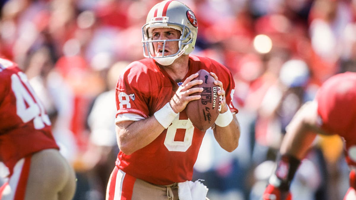 Steve Young led the NFL in touchdown passes in four separate seasons. (Photo by David Madison/Getty Images)