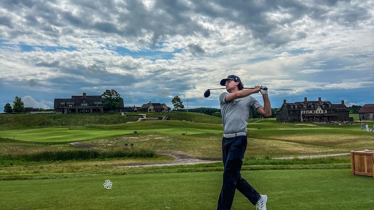 Colton Herta hits the links. (via Herta's Instagram)