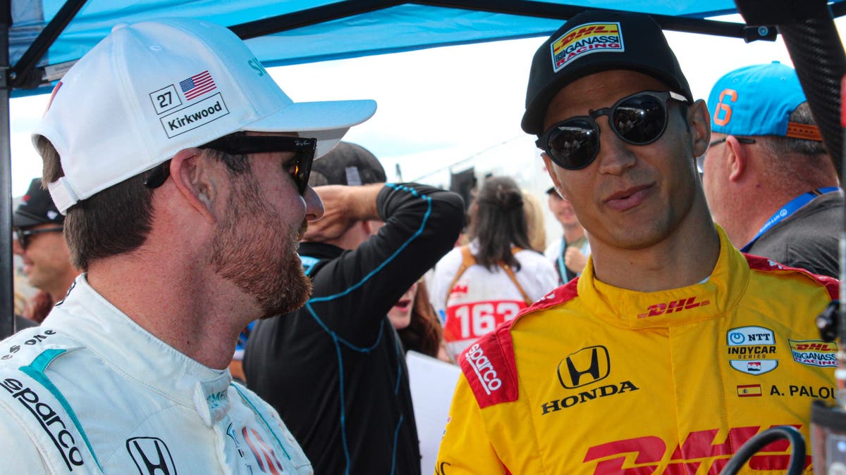 Backstage at driver introductions, Kirkwood chats up four-time series champion Alex Palou. (Photo by Ed McGregor/FOX Sports)
