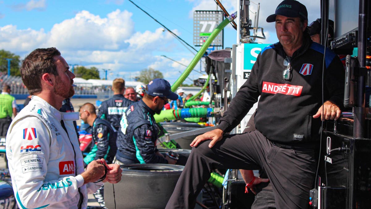 Drivers often quickly debrief with strategists or engineers. Kirkwood talks here with strategist Bryan Herta following the Milwaukee race. Then it's off to Nashville for the season finale. (Photo by Ed McGregor/FOX Sports)