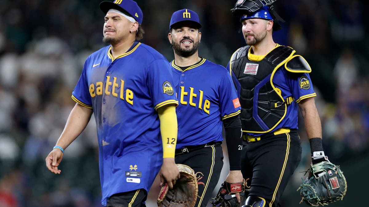 Josh Naylor and fellow trade addition Eugenio Suárez are teaming up with Cal Raleigh to create a power-packed trio for the Mariners. (Photo by Steph Chambers/Getty Images)