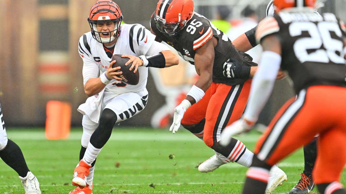 The last time Joe Burrow and the Bengals opened the season in Cleveland, the Browns' defense gave Cincinnati a rough time. (Photo by Jason Miller/Getty Images)