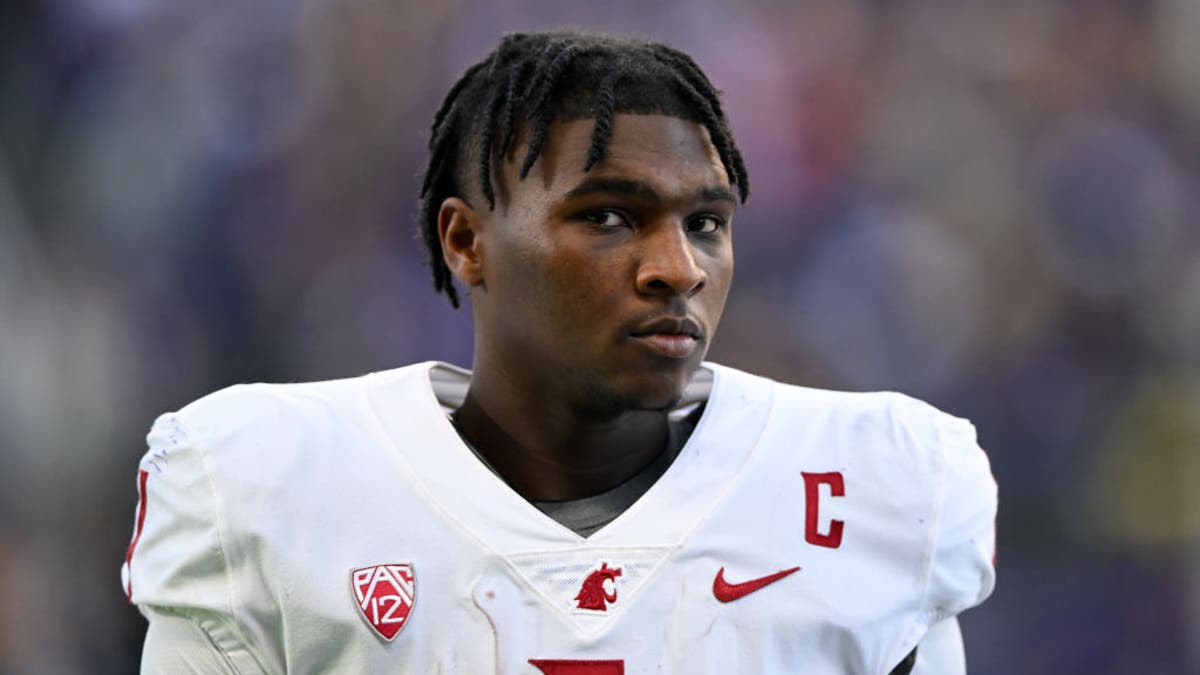 Catching Cam's games at Washington State meant long trips from Texas and early morning arrivals, but his parents never missed a kickoff. (Photo by Alika Jenner/Getty Images)