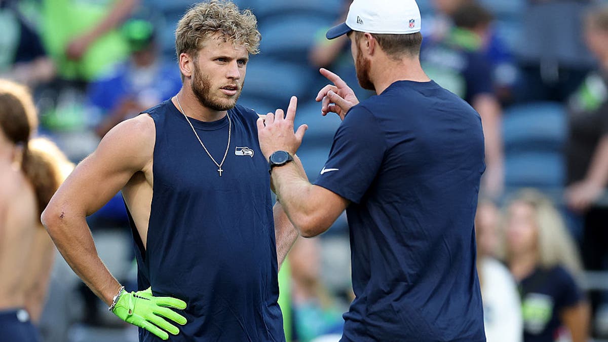 Cooper Kupp (left) and Sam Darnold have quickly built a bond as key additions for the Seahawks. (Photo by Steph Chambers/Getty Images)