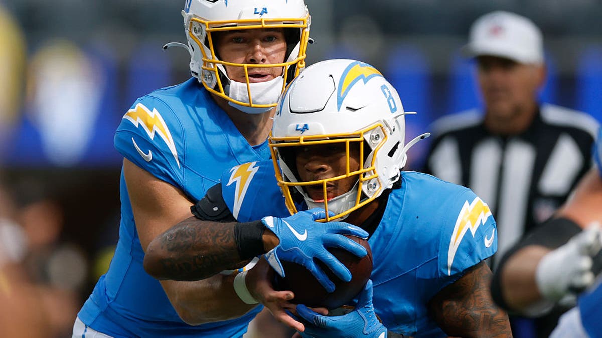 The Chargers drafted running back Omarion Hampton to help take some pressure off QB Justin Herbert to carry the offense. (Photo by Harry How/Getty Images)
