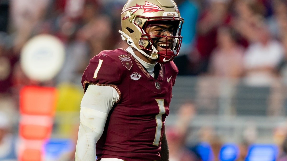 Florida State Seminoles quarterback Tommy Castellanos (1) celebrates a touchdown. (Photo by Chris Leduc/Icon Sportswire via Getty Images)