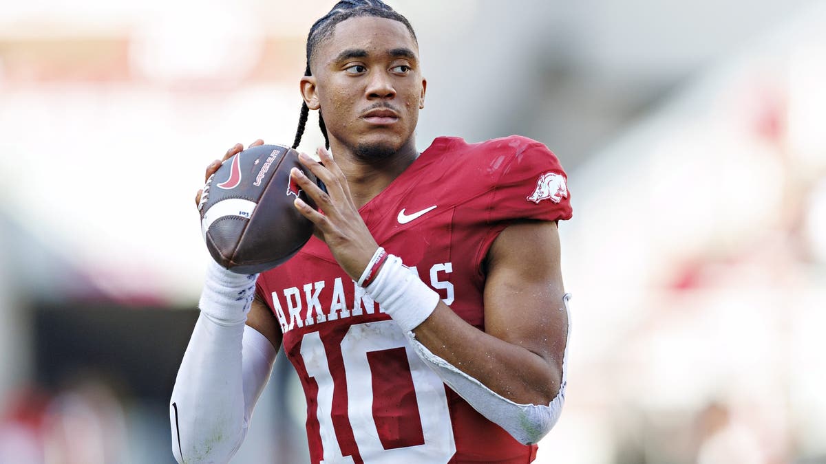 Arkansas QB Taylen Green #10 warms up before a game against Alabama A&M. (Photo by Wesley Hitt/Getty Images)