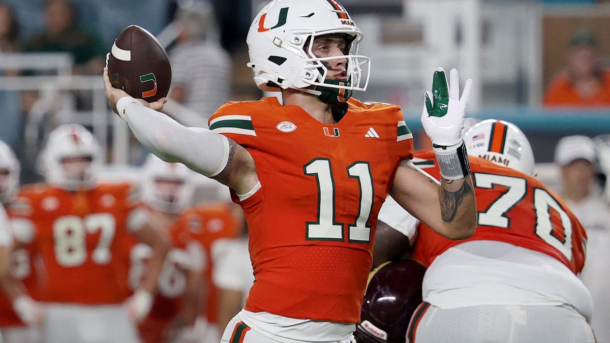 Carson Beck #11 of the Miami Hurricanes looks to pass against the Bethune-Cookman Wildcats. (Photo by Leonardo Fernandez/Getty Images)