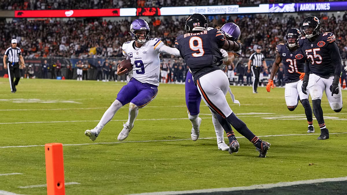 McCarthy runs for a fourth-quarter touchdown, giving the Vikings a 27-17 lead after they trailed 17-6 entering the final period. (Photo by Todd Rosenberg/Getty Images)