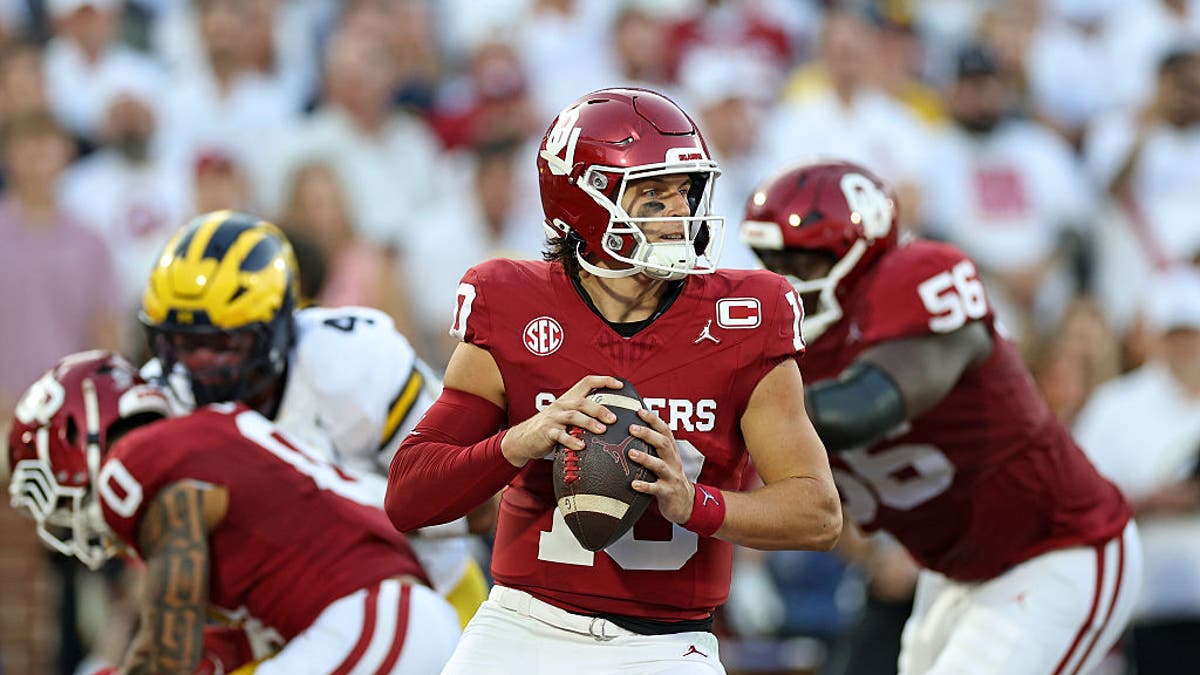 John Mateer was responsible for 344 total yards in Oklahoma's win over Michigan. (Photo by Stacy Revere/Getty Images)