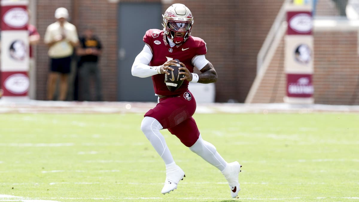 FSU QB Tommy Castellanos #1 rolls out on a pass play during a game against East Texas A&M. (Photo by Don Juan Moore/Getty Images)