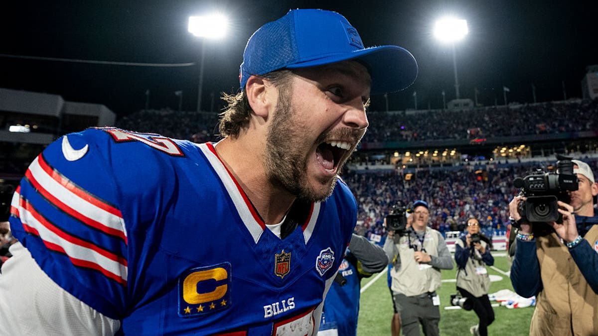 Josh Allen celebrates the Bills' incredible comeback win over the Ravens on Monday, in which Buffalo scored 18 points in the final four minutes. (Photo by Michael Owens/Getty Images)
