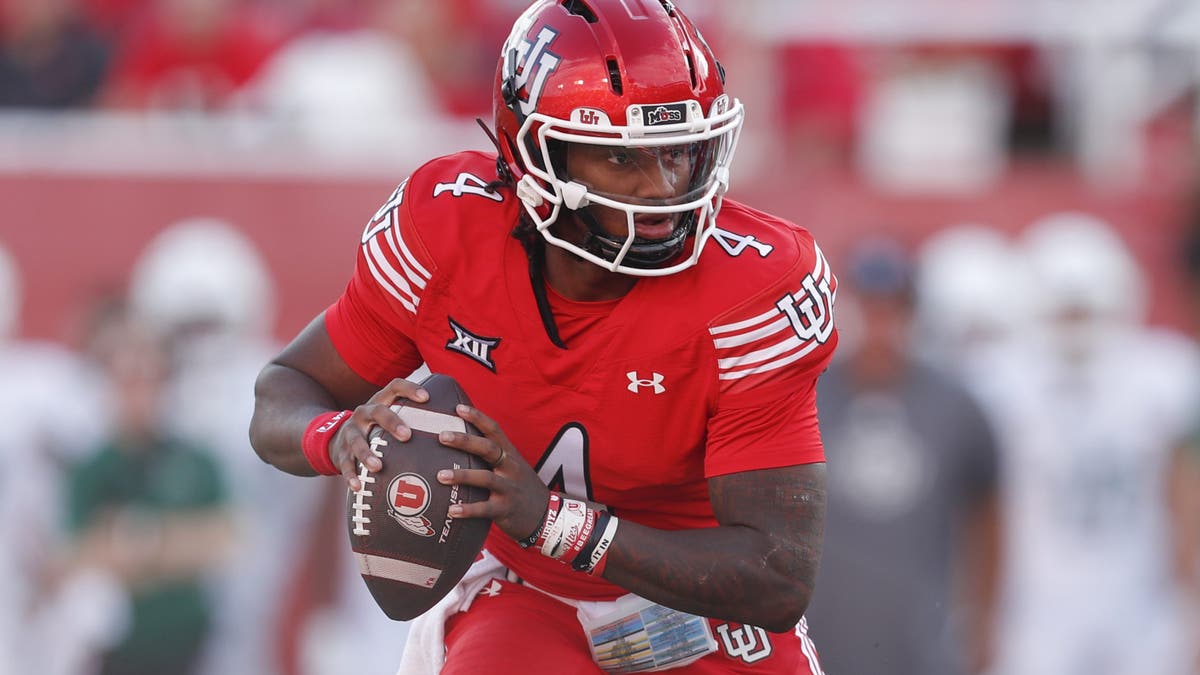 Devon Dampier #4 of the Utah Utes runs out of the pocket against Cal Poly. (Photo by Chris Gardner/Getty Images)