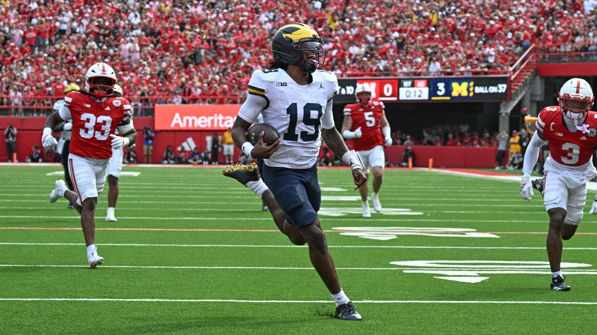 Bryce Underwood used his legs on multiple occasions in Saturday's win over Nebraska, including when he ran for a 37-yard touchdown. (Photo by Steven Branscombe/Getty Images)