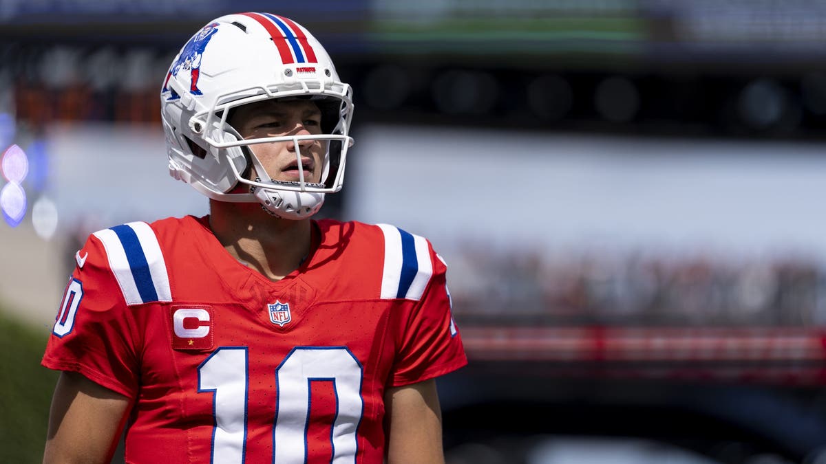 Drake Maye has thrown the ball perhaps better than any of his second-year QB peers, but his turnovers have proven costly. (Photo by Michael Owens/Getty Images)