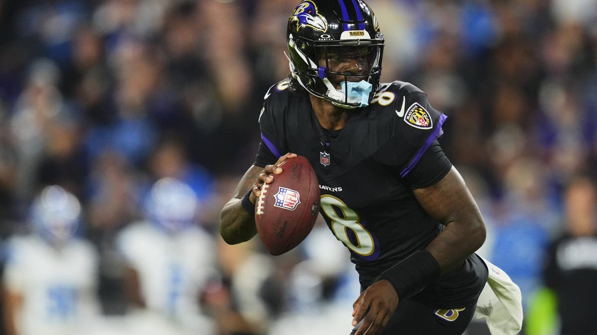 The Ravens falling to 1-2 puts a damper on Lamar Jackson's MVP candidacy. (Photo by Cooper Neill/Getty Images)