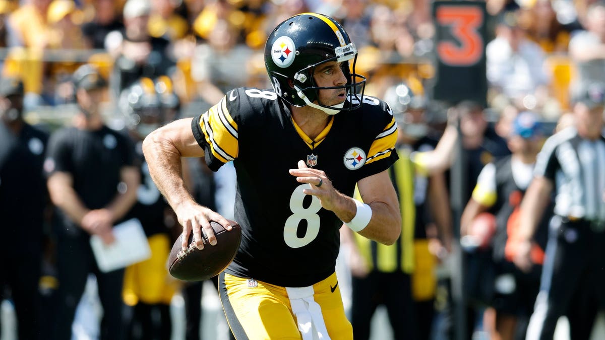 Aaron Rodgers made NFL history, but he couldn't get the win over the Seahawks. (Justin K. Aller/Getty Images)