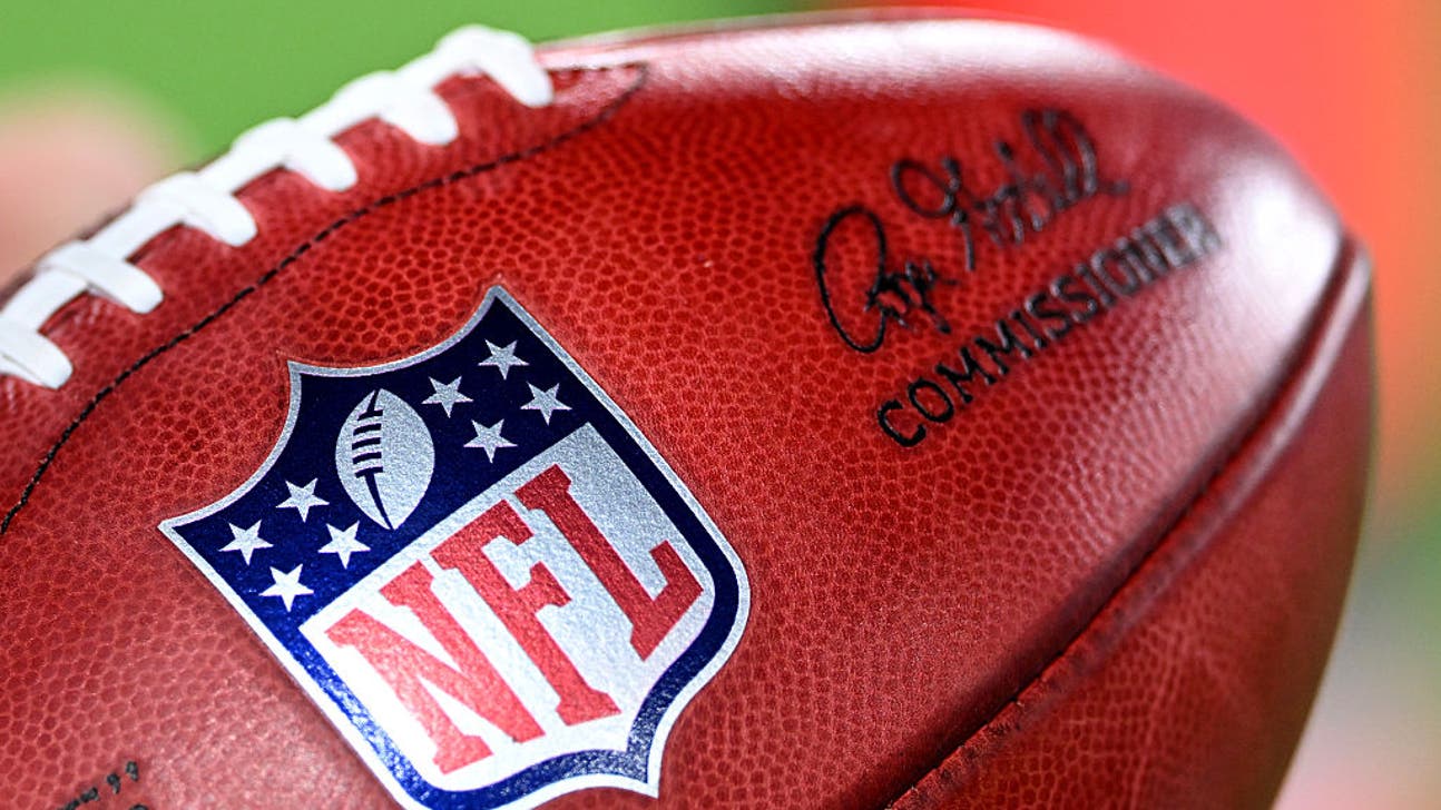 nfl logo on football