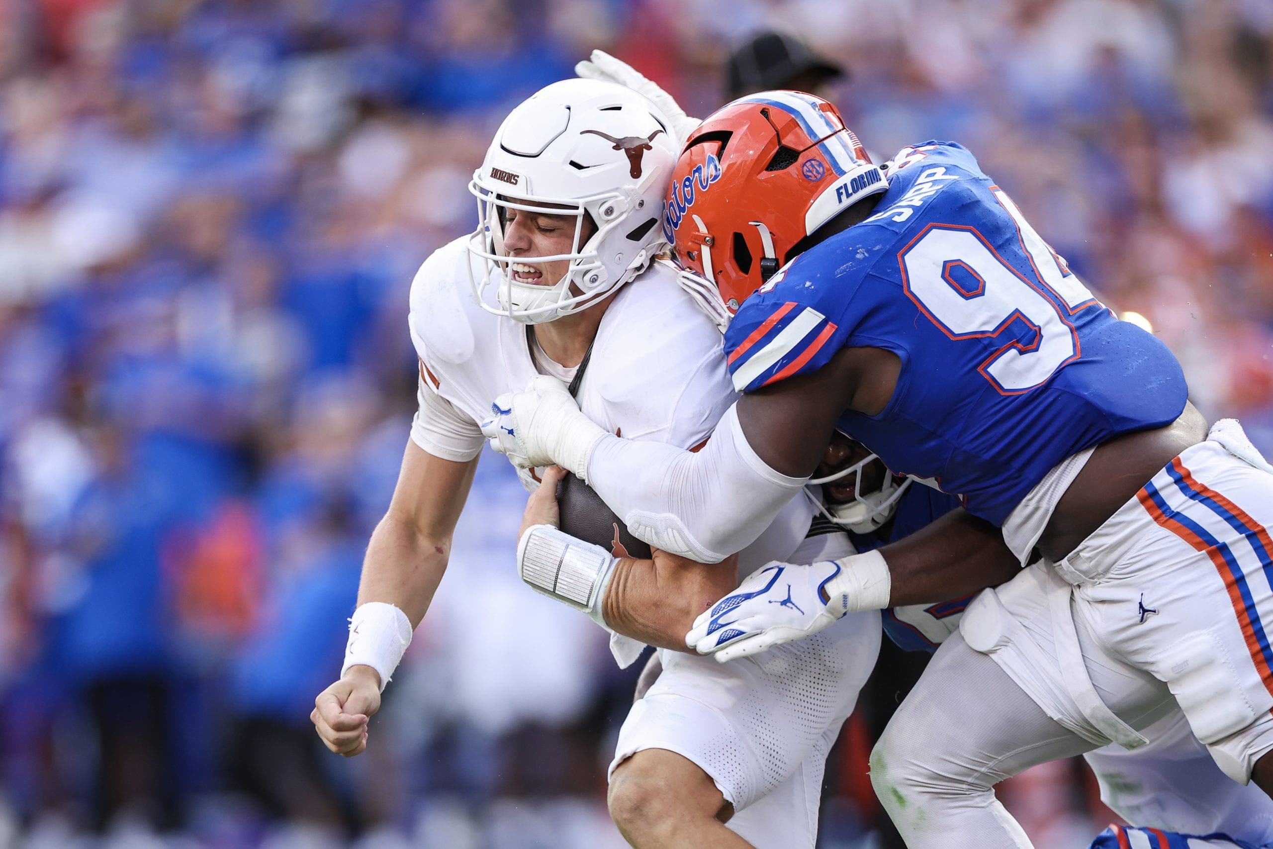 Arch Manning was sacked six times in Texas' loss to Florida. (Photo by James Gilbert/Getty Images)