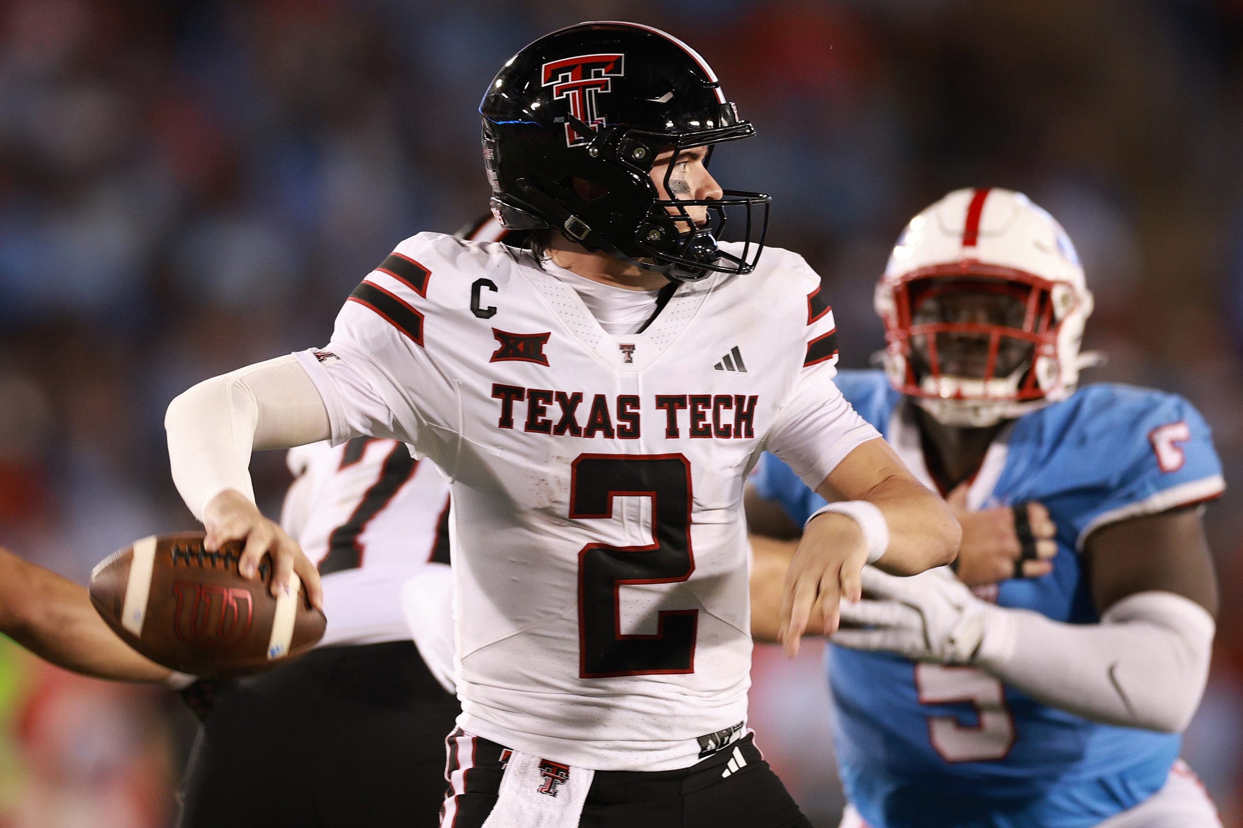 Behren Morton and Texas Tech are the only undefeated team remaining in the Big 12. (Photo by Kenneth Richmond/Getty Images)