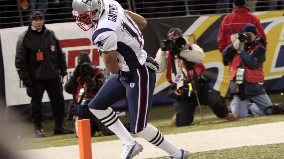 Jabar Gaffney made a toe-tapping touchdown grab to help the Patriots keep their undefeated regular season alive against the Ravens in 2007.  (Photo by George Bridges/MCT/Tribune News Service via Getty Images)