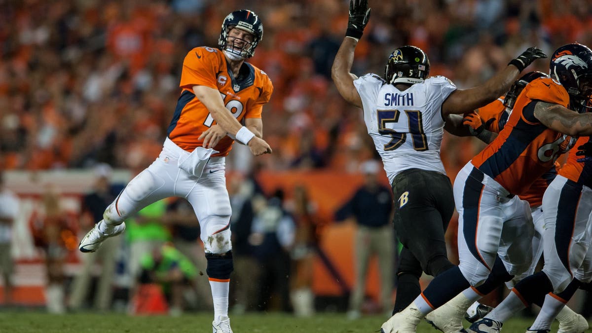 Peyton Manning threw seven touchdowns in the Broncos' season-opening win over the Ravens in 2013. (Photo by Dustin Bradford/Getty Images)