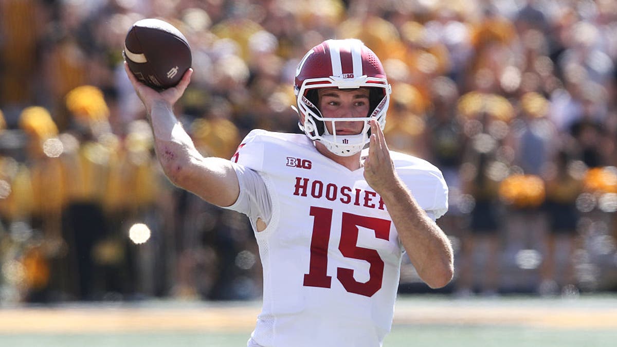 Fernando Mendoza has thrown for 1,208 yards and 16 touchdowns through five games this season. (Photo by Matthew Holst/Getty Images)