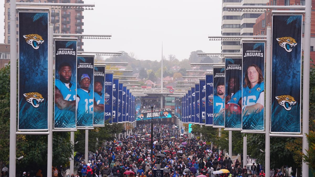 Fans arriving at Wembley Stadium for Rams-Jaguars showdown.
