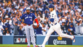 Dodgers’ Roberts, Blue Jays’ Schneider Differ on Using Ghost Runner in Playoffs