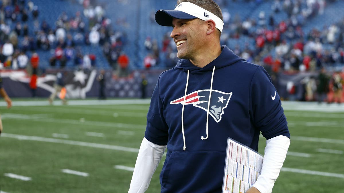 Patriots offensive coordinator Josh McDaniels has helped Drake Maye become an MVP candidate this season. Is that good enough for teams to consider him for head coach vacancies after failed stints with the Broncos and Raiders? (Photo by Danielle Parhizkaran/The Boston Globe via Getty Images)