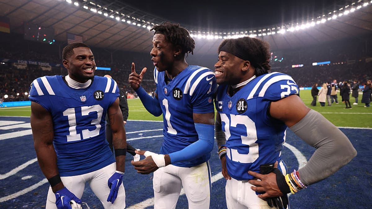 The addition of Sauce Gardner (center) strengthens a Colts defense that could help the team make a deep postseason run. (Photo by Maja Hitij/Getty Images)