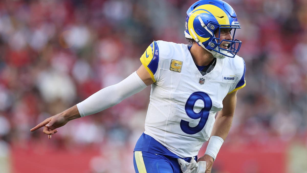 Matthew Stafford threw for four touchdowns and zero interceptions in the Rams' win over the 49ers on Sunday, marking the third straight game he's done that. It's the first time in NFL history that a quarterback has done that in three straight games. (Photo by Ezra Shaw/Getty Images)