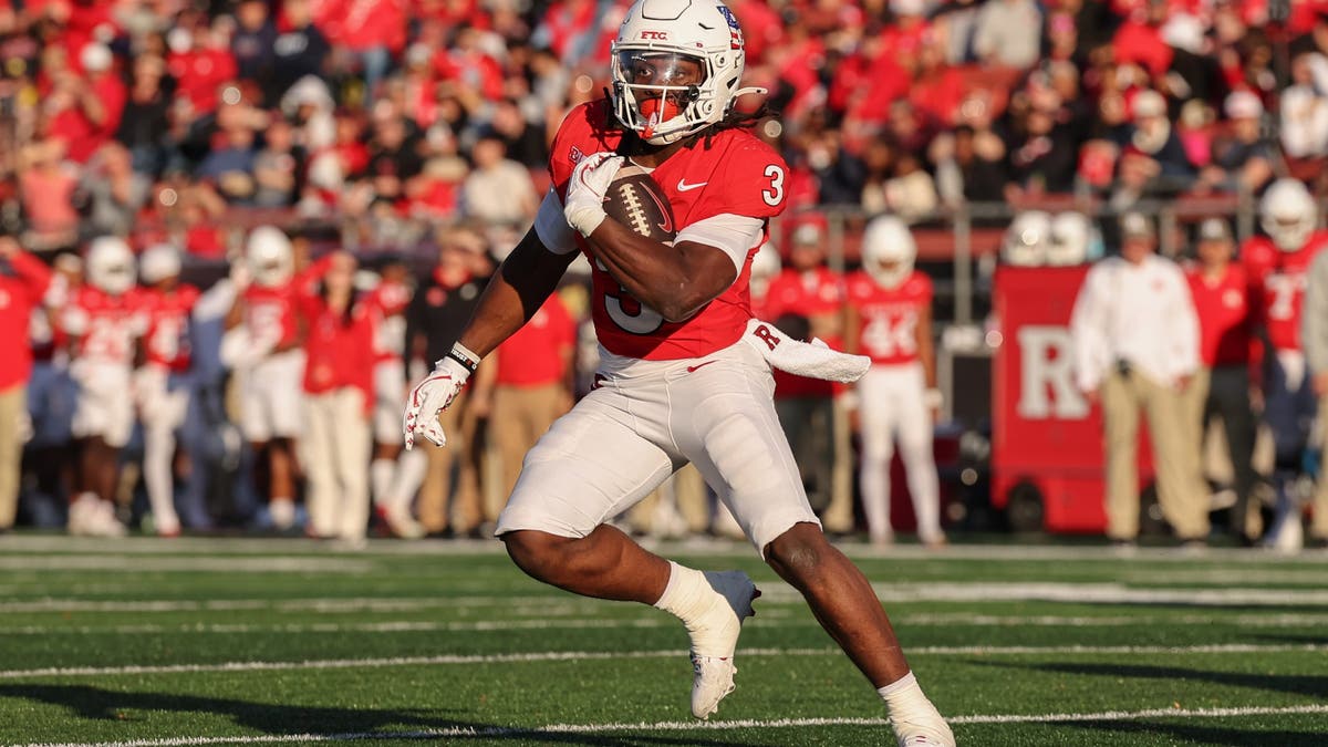 Antwan Raymond #3 of the Rutgers Scarlet Knights runs with the ball against the Maryland Terrapins. (Photo by Ed Mulholland/Getty Images)