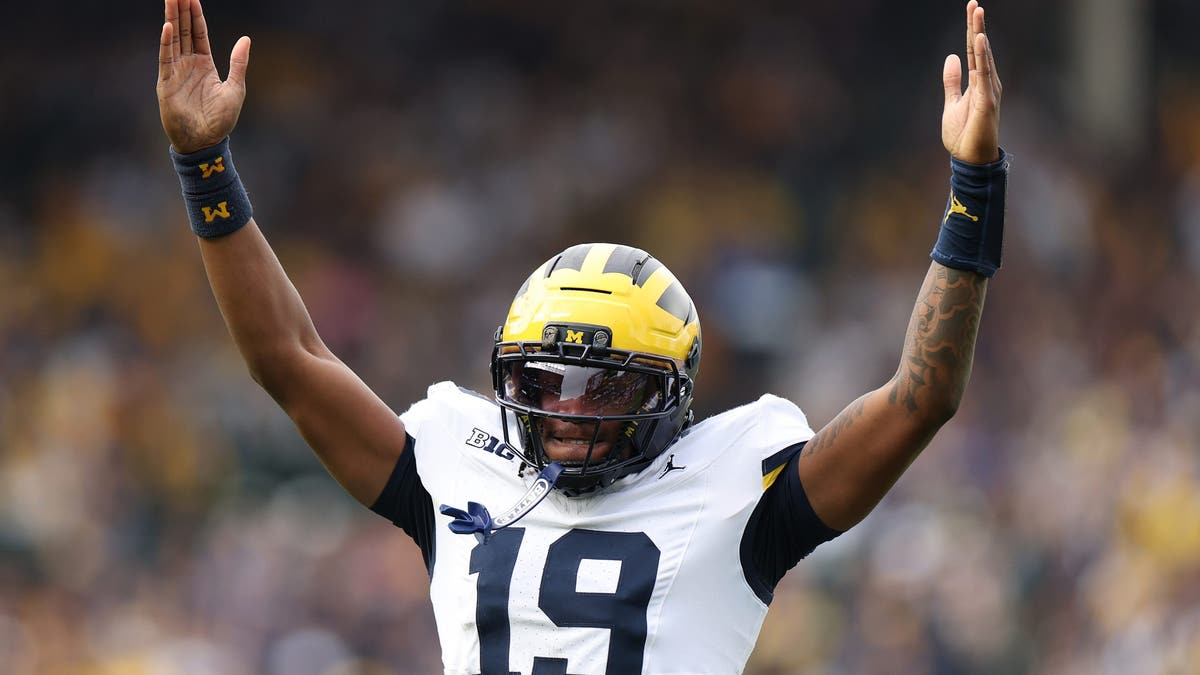 Bryce Underwood and Michigan were able to get a thrilling, last-second win over Northwestern in Week 12 to seemingly keep its CFP hopes alive. (Photo by Michael Reaves/Getty Images)