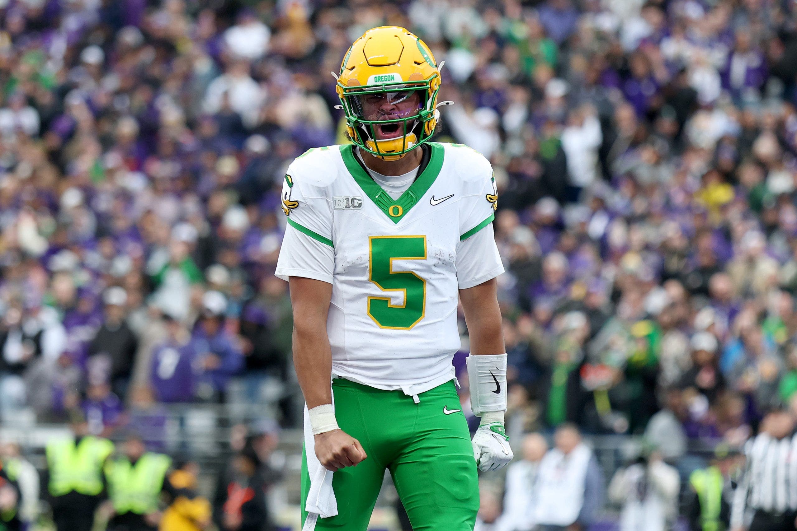 Oregon's Dante Moore has also received some draft love, but should he wait aonther year to declare? (Photo by Steph Chambers/Getty Images)