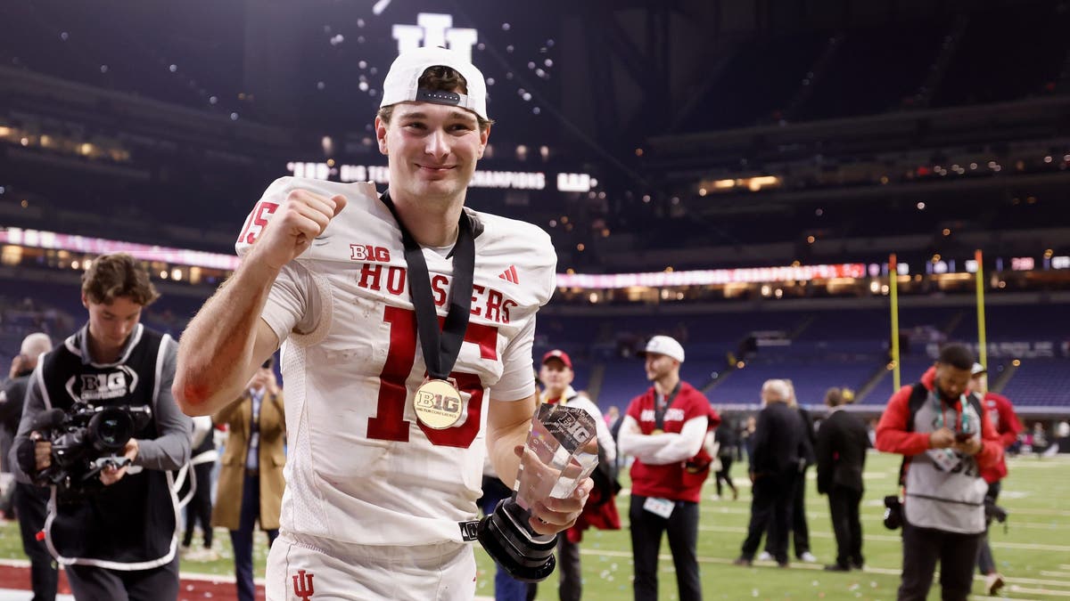 Fernando Mendoza is playing in his first game since winning the Heisman Trophy, with his performance in Indiana's Big Ten Championship Game victory playing a big role in earning that prize.  (Photo by Michael Reaves/Getty Images)