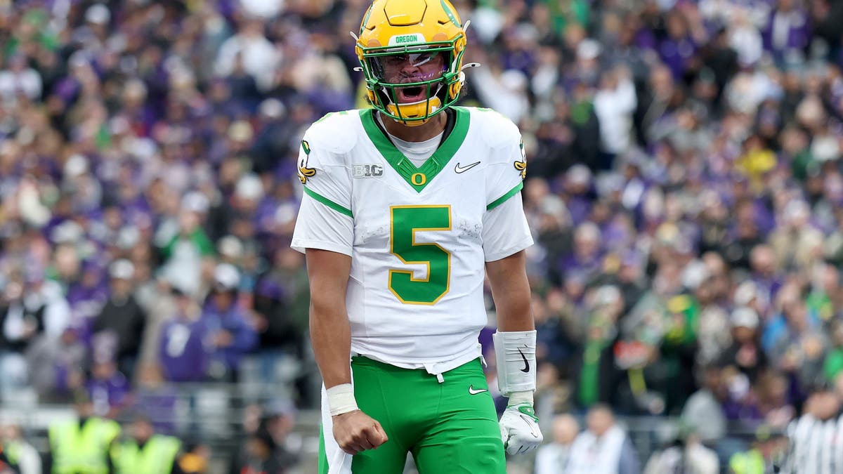 Oregon's Dante Moore has also received some draft love, but should he wait aonther year to declare? (Photo by Steph Chambers/Getty Images)