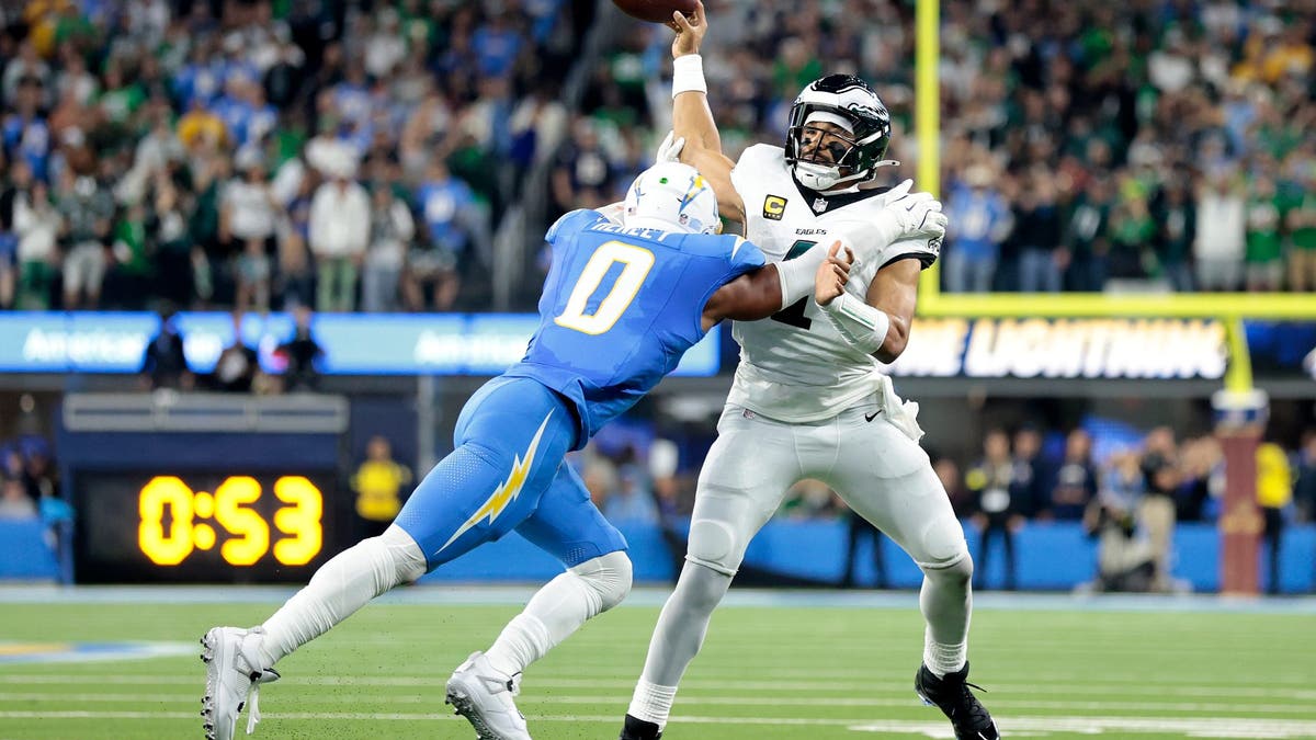 It was a long night for Jalen Hurts in the Eagles' loss to the Chargers. (Ronald Martinez/Getty Images)
