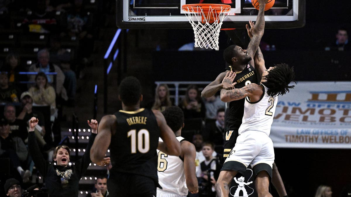 Vanderbilt's Mike James blocks a shot by Wake Forest's Juke Harris in a dominant win that dropped the Demon Deacons in NET. (Photo by Grant Halverson/Getty Images)