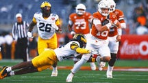 MICHIGAN WOLVERINES Trending Image: Arch Manning Stars as Texas Beats Michigan in the Citrus Bowl