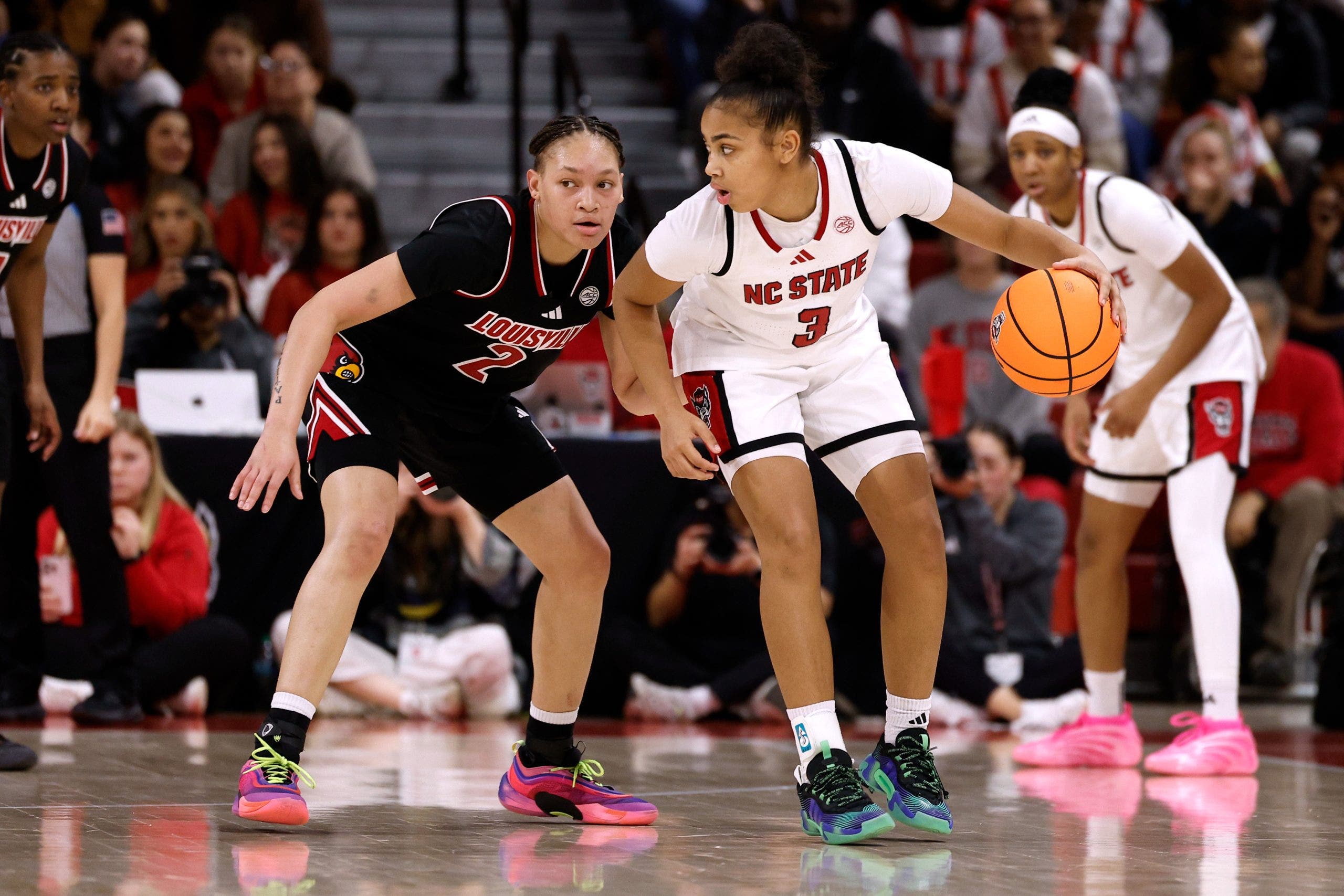 Louisville's wins against Notre Dame and NC State propelled it into NET's top 10. (Photo by Lance King/Getty Images)