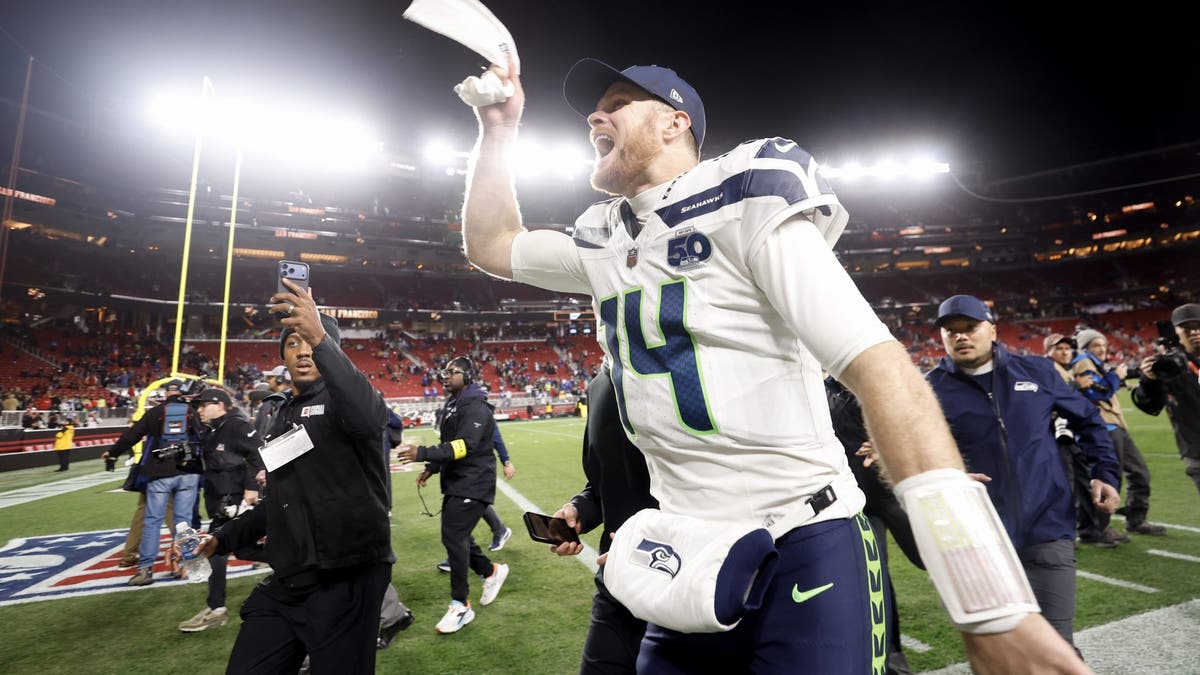Sam Darnold joined Tom Brady as the only quarterbacks to ever win 14 games in back-to-back seasons in NFL history. (Photo by Lachlan Cunningham/Getty Images)