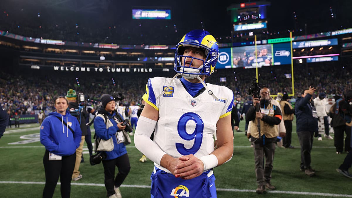Rams quarterback Matthew Stafford walked off the field after losing the NFC Championship Game at Lumen Field with a bloody hand and an uncertain future. (Eric Thayer / Los Angeles Times via Getty Images)