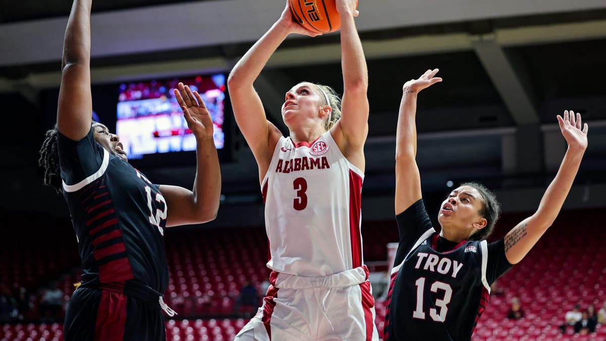 Troy swarms underneath the basket as a rule, and leads Division I in rebounding because of it. (Photo by Brandon Sumrall/Getty Images)