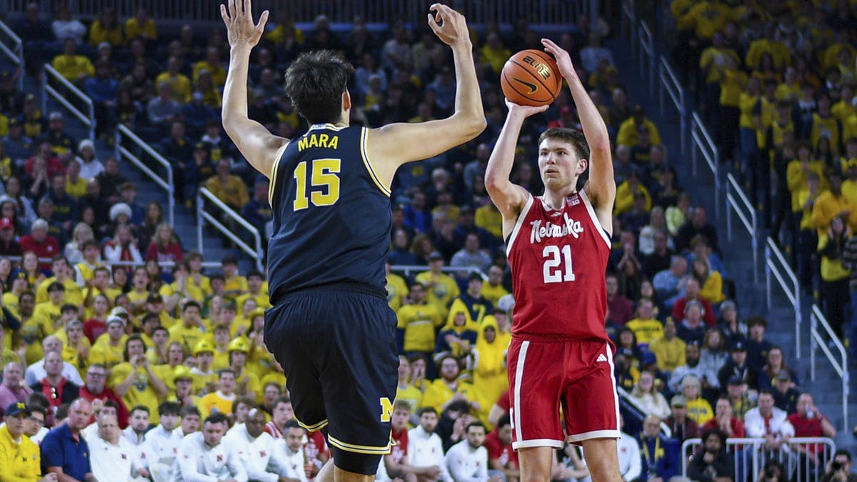 Pryce Sandfort of the Nebraska Cornhuskers attempts a shot over Aday Mara of the Michigan Wolverines. (Photo by Aaron J. Thornton/Getty Images)
